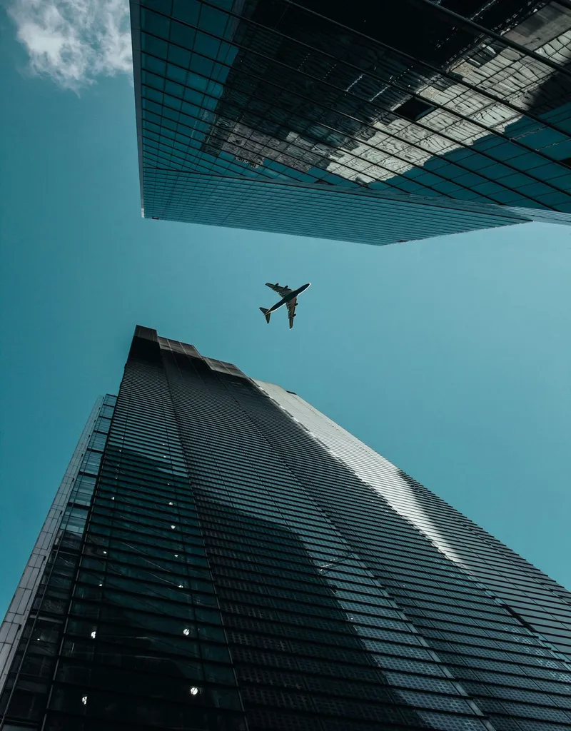 Plane in flight representing financial growth and opportunity